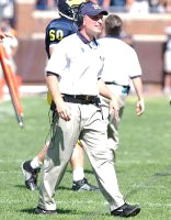 Michigan Coach and Jeremy Van Alstyne (50)