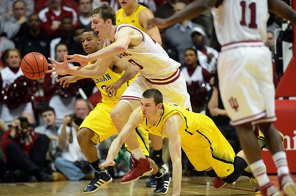 Trey Burke (3) and Nik Stauskas (11)