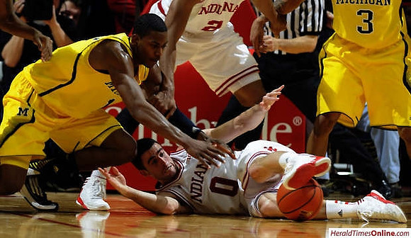Glenn Robinson III (1) and Trey Burke (3)