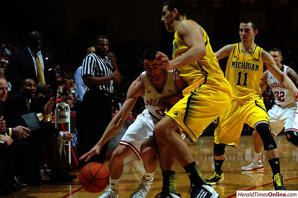 Mitch McGary (4) and Nik Stauskas (11)