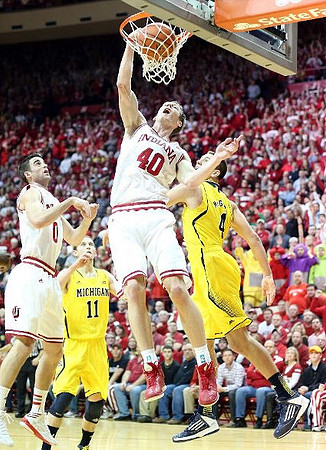 Nik Stauskas (11) and Mitch McGary (4)