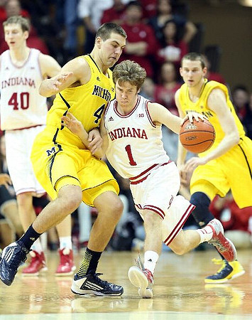 Mitch McGary (4) and Nik Stauskas (11)