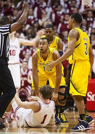 Jon Horford (15), Glenn Robinson III (1), and Trey Burke (3)