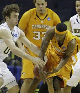 Zack Novak (0) and Jordan Morgan (52)