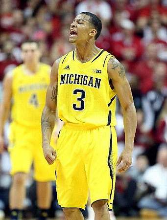 Trey Burke (3) and Glenn Robinson III (1)