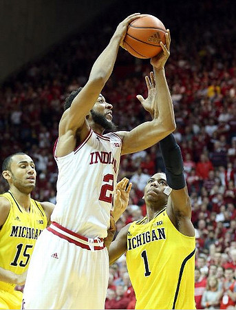 Jon Horford (15) and Glenn Robinson III (1)