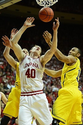 Nik Stauskas (11) and Jon Horford (15)