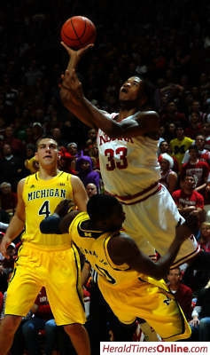 Mitch McGary (4) and Tim Hardaway Jr. (10)