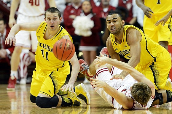 Nik Stauskas (11) and Jon Horford (15)