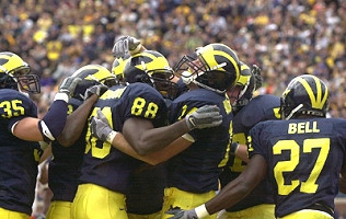Brian Thompson (35), Tim Massaquoi (88), Calvin Bell (27), and Andy Mignery (14)