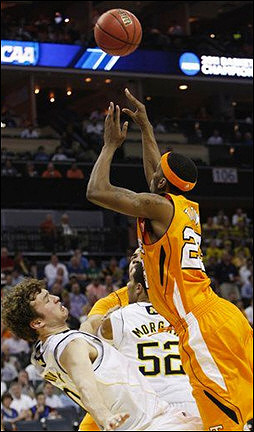 Zack Novak (0) and Jordan Morgan (52)