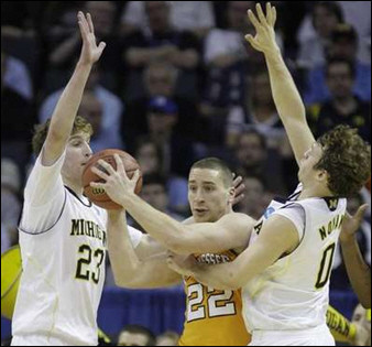Evan Smotrycz (23) and Zack Novak (0)