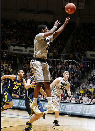 Jon Horford (15) and Spike Albrecht (2)