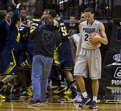 Andrew Dakich (5), Glenn Robinson III (1), Caris LeVert (23), Nik Stauskas (11), and Jordan Morgan (52)