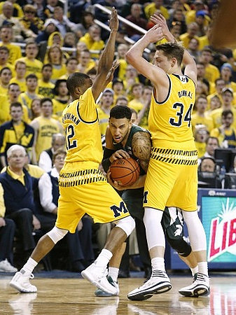 Muhammad-Ali Abdur-Rahkman (12) and Mark Donnal (34)