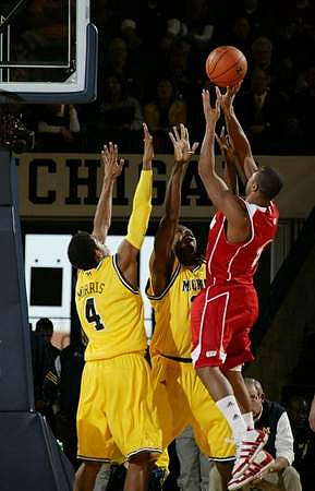 Darius Morris (4) and Manny Harris (3)