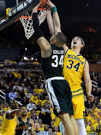 Zak Irvin (21) and Mark Donnal (34)