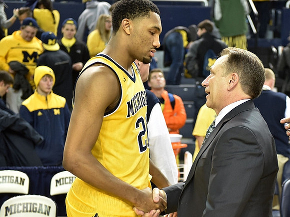 Zak Irvin (21) and Michigan State Head Coach Tom Izzo