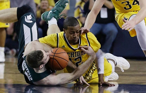 Muhammad-Ali Abdur-Rahkman (12) and Mark Donnal (34)