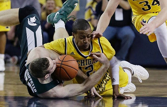 Muhammad-Ali Abdur-Rahkman (12) and Mark Donnal (34)