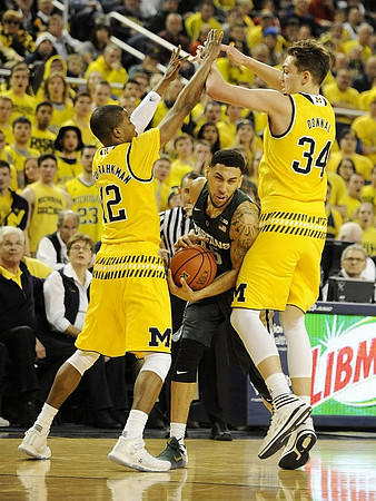 Muhammad-Ali Abdur-Rahkman (12) and Mark Donnal (34)