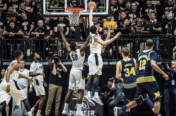 Mark Donnal (34) and Muhammad-Ali Abdur-Rahkman (12)