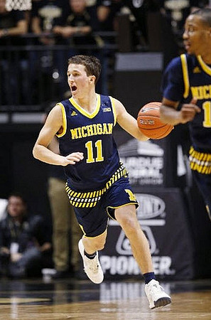 Andrew Dakich (11) and Muhammad-Ali Abdur-Rahkman (12)
