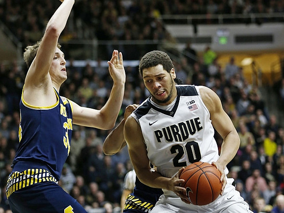 Mark Donnal (34) and Andrew Dakich (11)