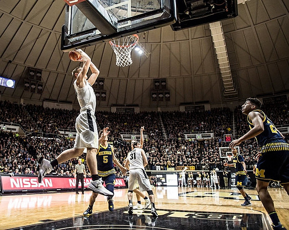 D.J. Wilson (5), Muhammad-Ali Abdur-Rahkman (12), and Aubrey Dawkins (24)