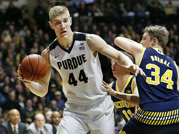 Mark Donnal (34) and Andrew Dakich (11)