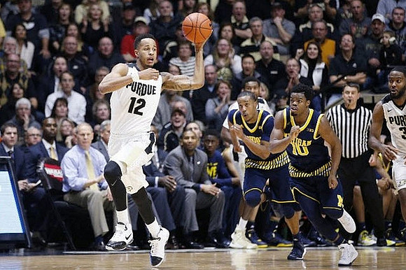 Muhammad-Ali Abdur-Rahkman (12) and Derrick Walton Jr. (10)