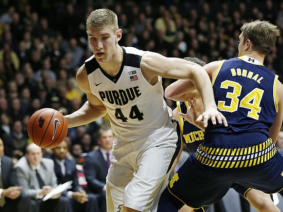 Mark Donnal (34) and Andrew Dakich (11)