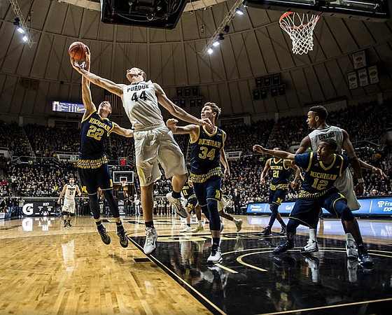Duncan Robinson (22), Mark Donnal (34), Zak Irvin (21), and Muhammad-Ali Abdur-Rahkman (12)