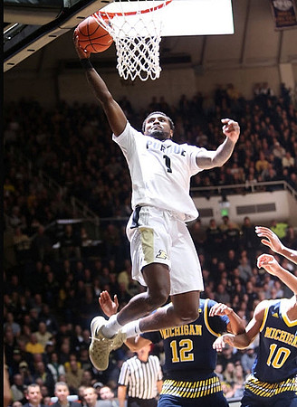 Muhammad-Ali Abdur-Rahkman (12) and Derrick Walton Jr. (10)