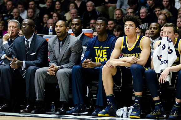 Jeff Meyer, Bacari Alexander, LaVall Jordan, Caris LeVert (23), D.J. Wilson (5), and Duncan Robinson (22)