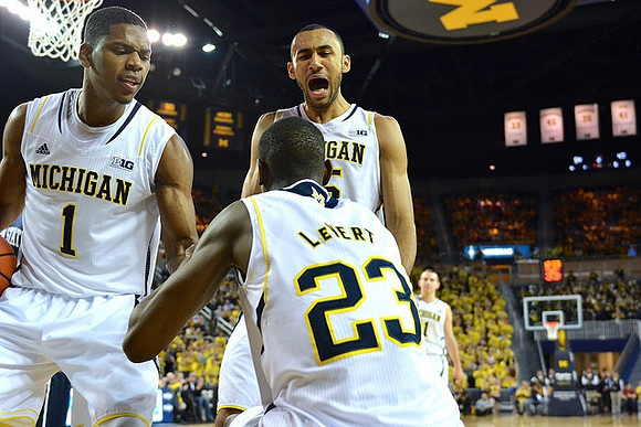Glenn Robinson III (1), Caris LeVert (23), and Jon Horford (15)