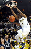 Glenn Robinson III (1) and Derrick Walton Jr. (10)