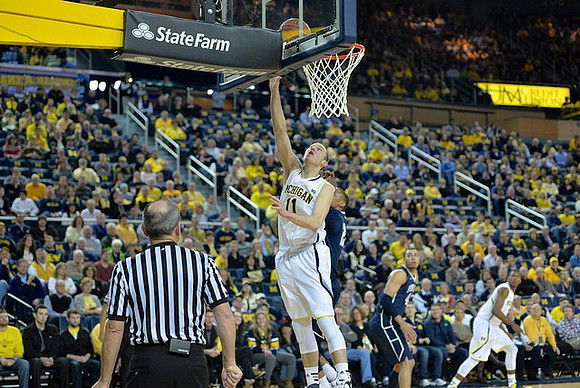 Nik Stauskas (11) and Glenn Robinson III (1)