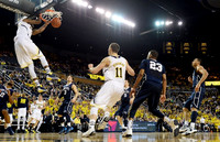 Glenn Robinson III (1), Spike Albrecht (2), and Nik Stauskas (11)