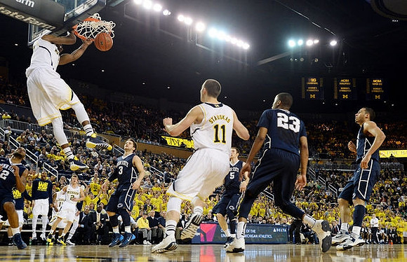 Glenn Robinson III (1), Spike Albrecht (2), and Nik Stauskas (11)
