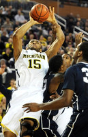 Jon Horford (15) and Glenn Robinson III (1)