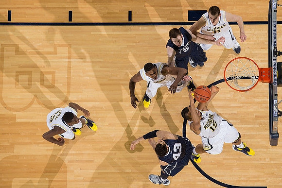 Caris LeVert (23), Glenn Robinson III (1), Jon Horford (15), and Nik Stauskas (11)
