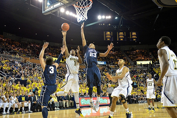 Glenn Robinson III (1), Jon Horford (15), Caris LeVert (23), and Derrick Walton Jr. (10)