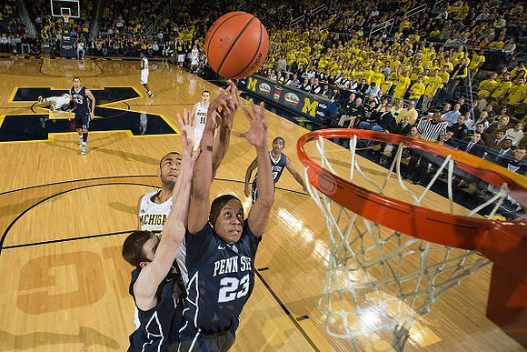 Jon Horford (15) and Nik Stauskas (11)