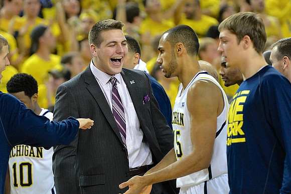 Derrick Walton Jr. (10), Mitch McGary (4), Jon Horford (15), and Mark Donnal (34)