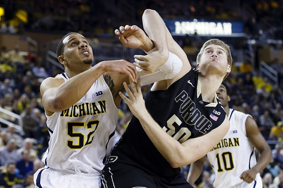 Jordan Morgan (52) and Derrick Walton Jr. (10)