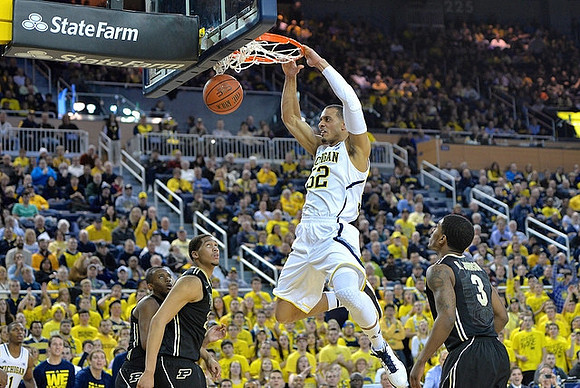 Jordan Morgan (52) and Glenn Robinson III (1)