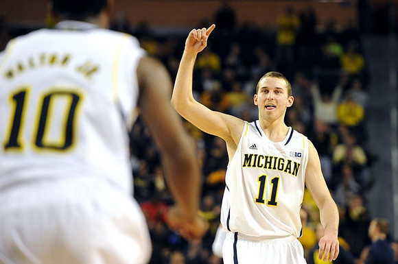 Derrick Walton Jr. (10) and Nik Stauskas (11)