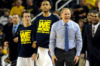 Andrew Dakich (5), Jon Horford (15), and John Beilein