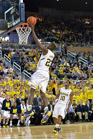 Caris LeVert (23) and Derrick Walton Jr. (10)